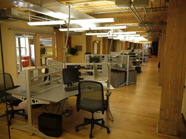 open plan office floor with desks